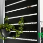 Virágcserép a pergola fémbetétjén